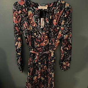 Light weight fun pattern dress. Never worn.